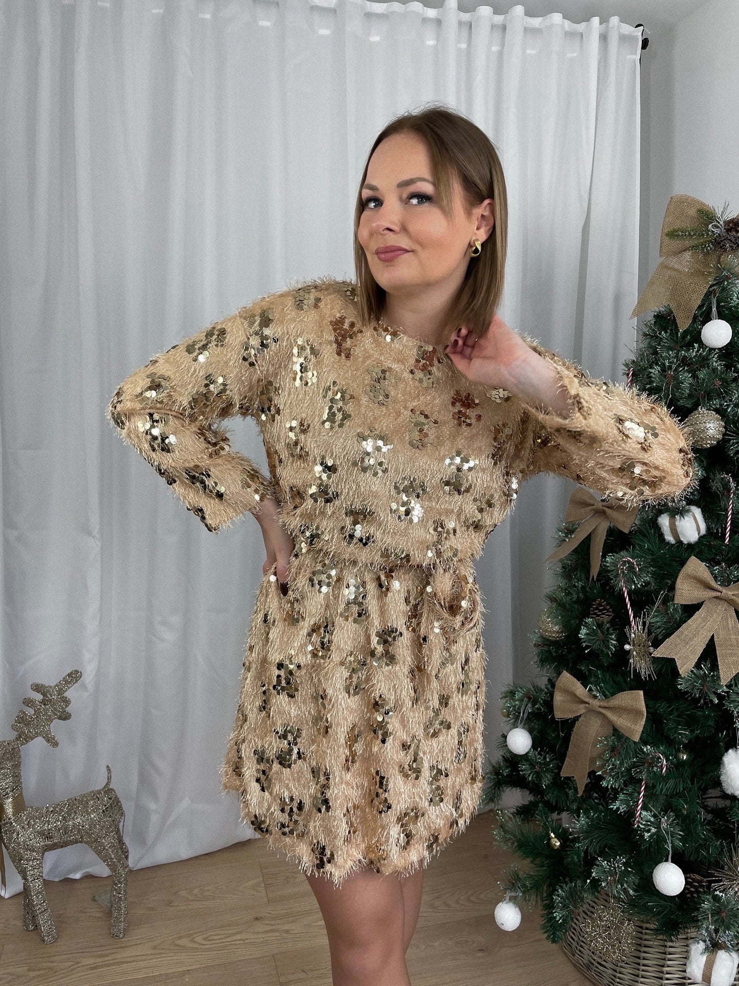 Robe à plumes dorées "L'ORIGINALE"